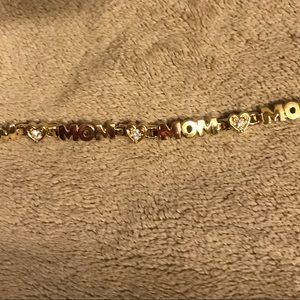 Gold tone and crystal MOM bracelet